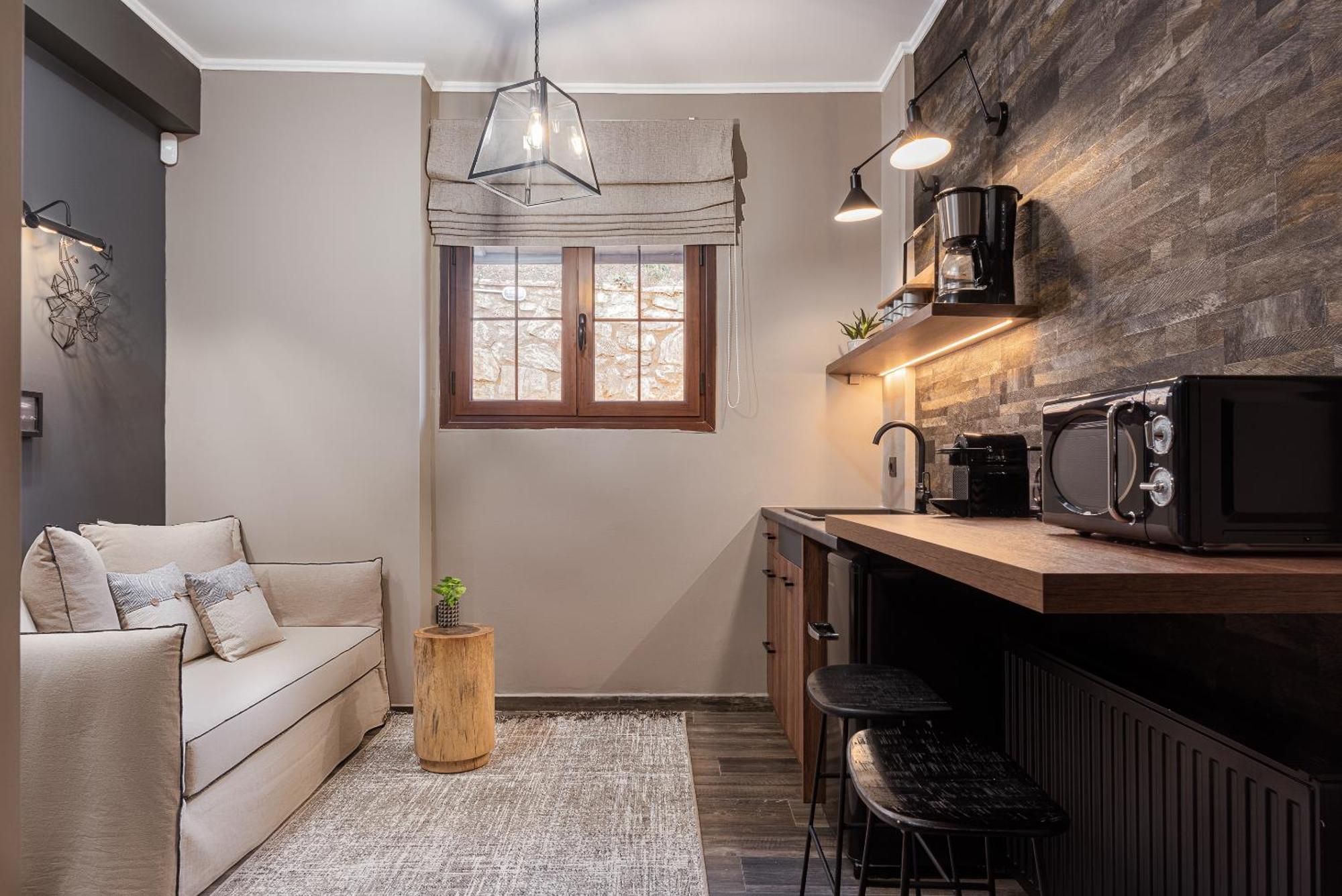 Gm Luxury Suites Kalavryta Quarto foto